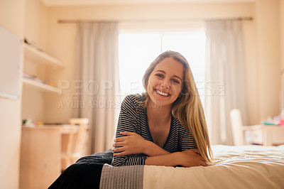 Buy stock photo Full length portrait of an attractive young woman lying on her bed