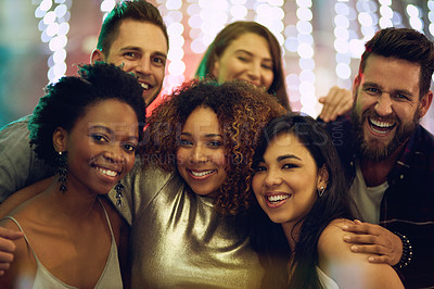 Buy stock photo Portrait of a group of friends having fun at a nightclub