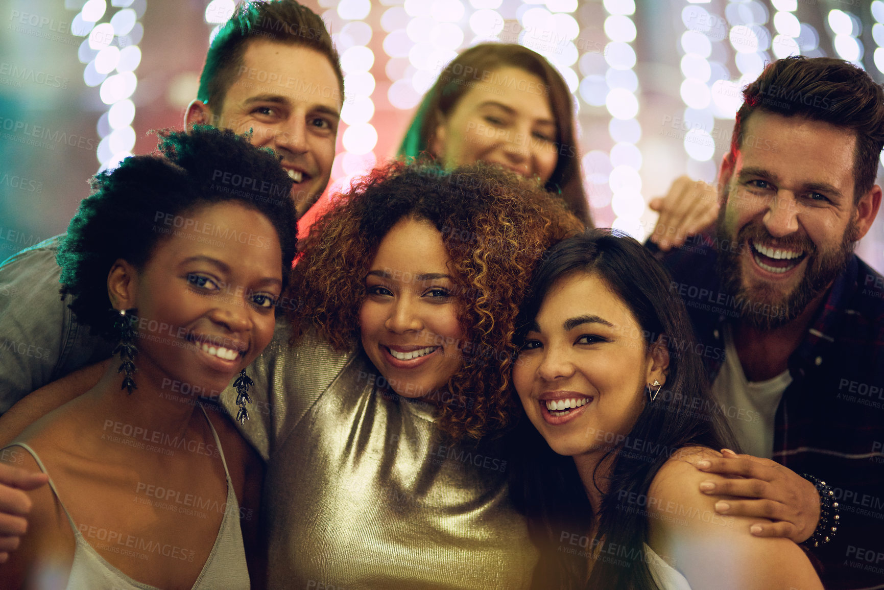 Buy stock photo Portrait of a group of friends having fun at a nightclub