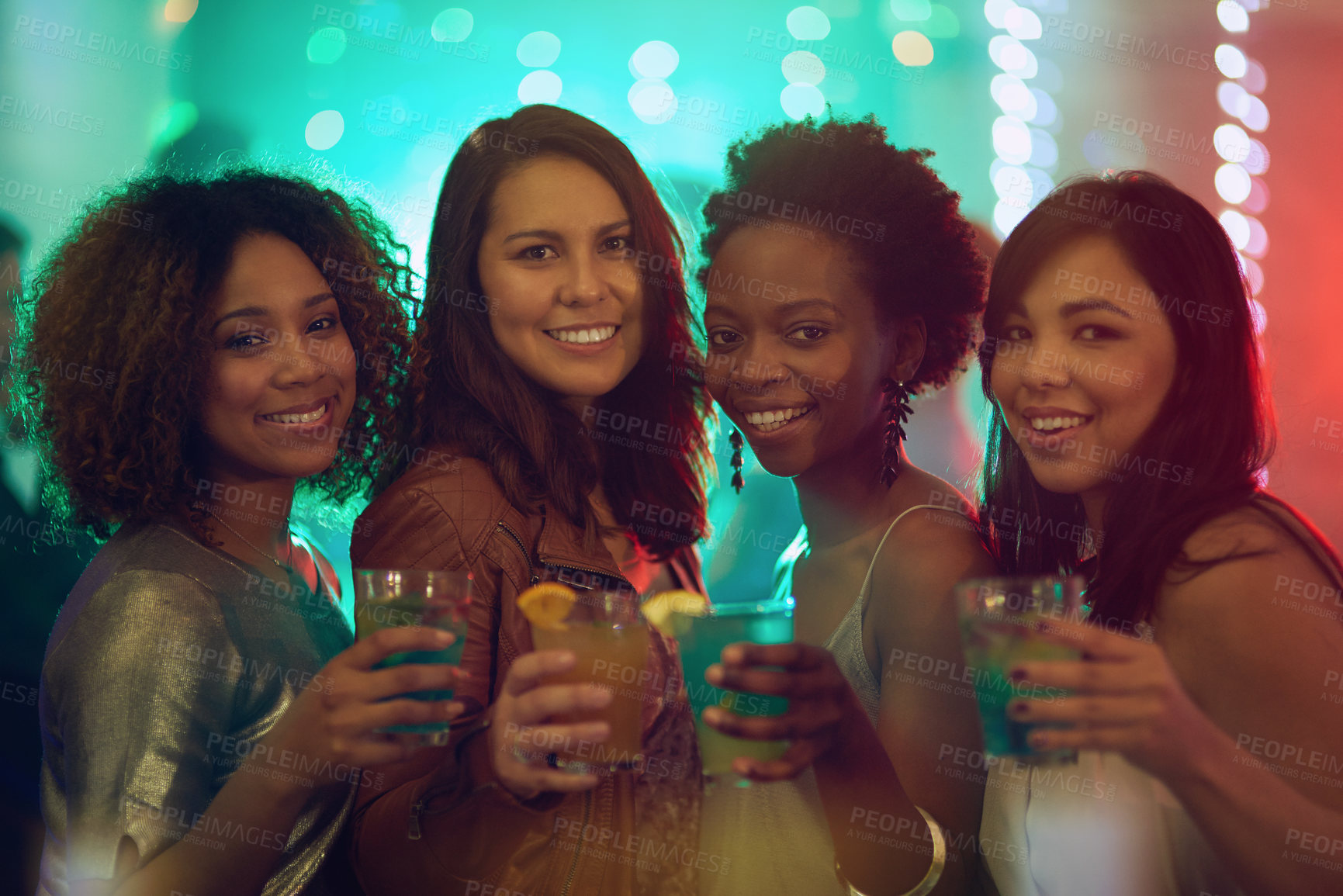 Buy stock photo Portrait of a group of young women having fun at a nightclub