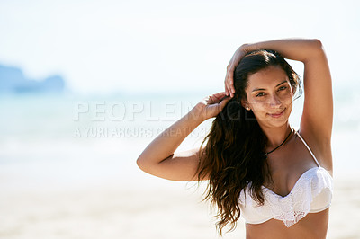 Buy stock photo Closeup shot of a beautiful young woman posing on the beach
