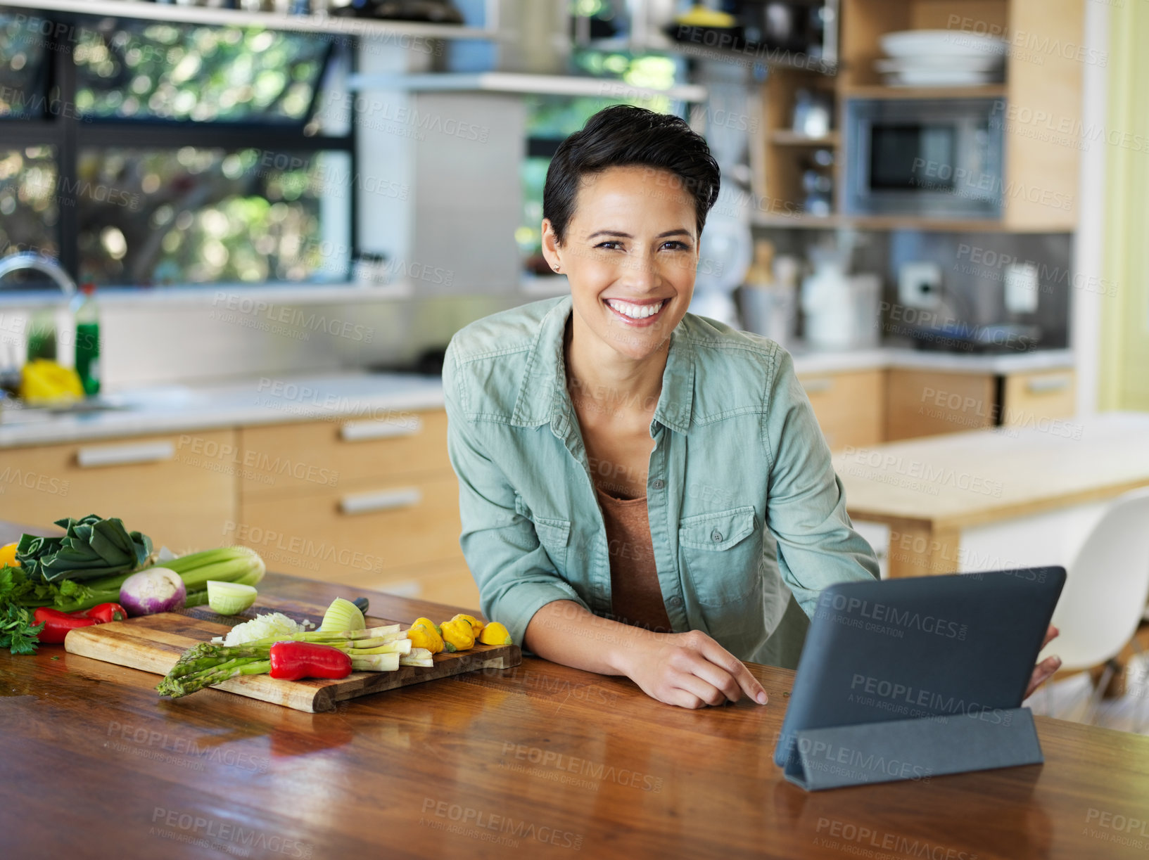 Buy stock photo Woman, portrait and tablet with vegetable, recipe and planning for health and wellness. Lady, nutrition and diet with vitamins, lettuce and salad with peppers and chilli for organic minerals or taste