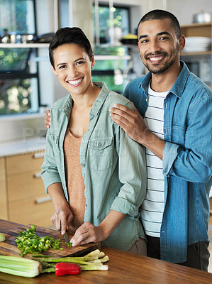 Buy stock photo Portrait, cooking and couple in kitchen for love, healthy food and bonding together with date. Vegetables, happy man and woman at counter with knife for cutting, nutrition meal or preparation in home