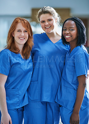 Buy stock photo Portrait, nurses and team in a hospital, healthcare and happiness with doctors, career and friends. Medical student, surgeons or staff in uniform, wellness or teamwork with success or professional