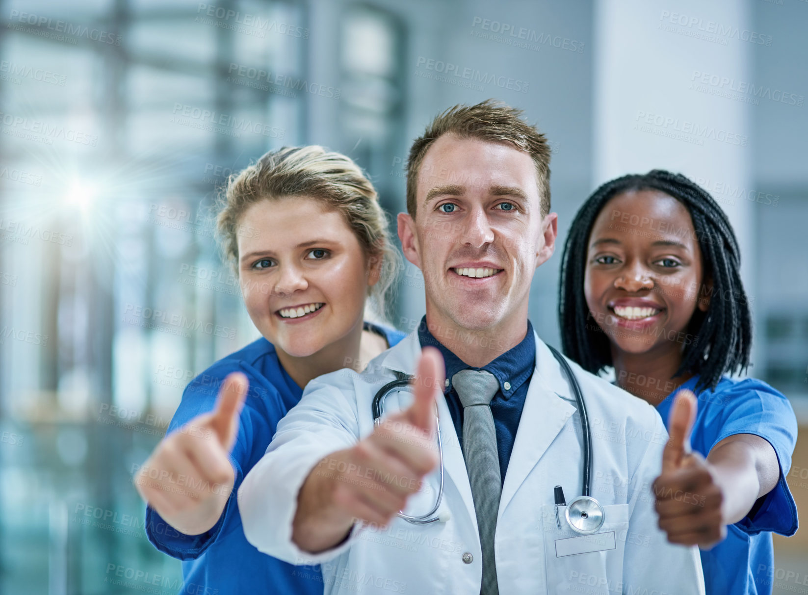 Buy stock photo Portrait, teamwork and doctors in clinic, thumbs up or agreement with support, cooperation or feedback. Face, people or medical with professional, hand gesture or thank you for review or hand gesture