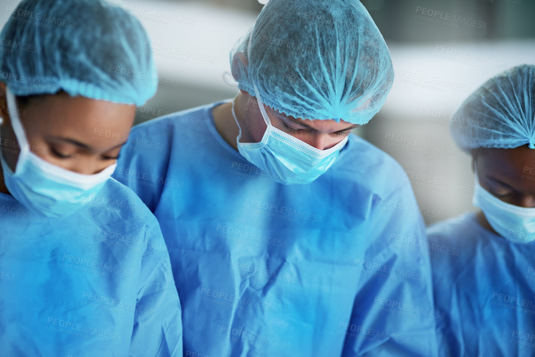 Buy stock photo Teamwork, surgery and doctors with face mask and scrubs in hospital for medical procedure and emergency. Surgeon team, examination and peaople with medicine in theatre for diagnosis and collaboration