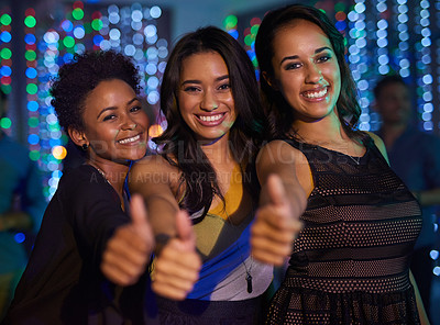 Buy stock photo Portrait of a group of young ladies showing thumbs up while partying in a club