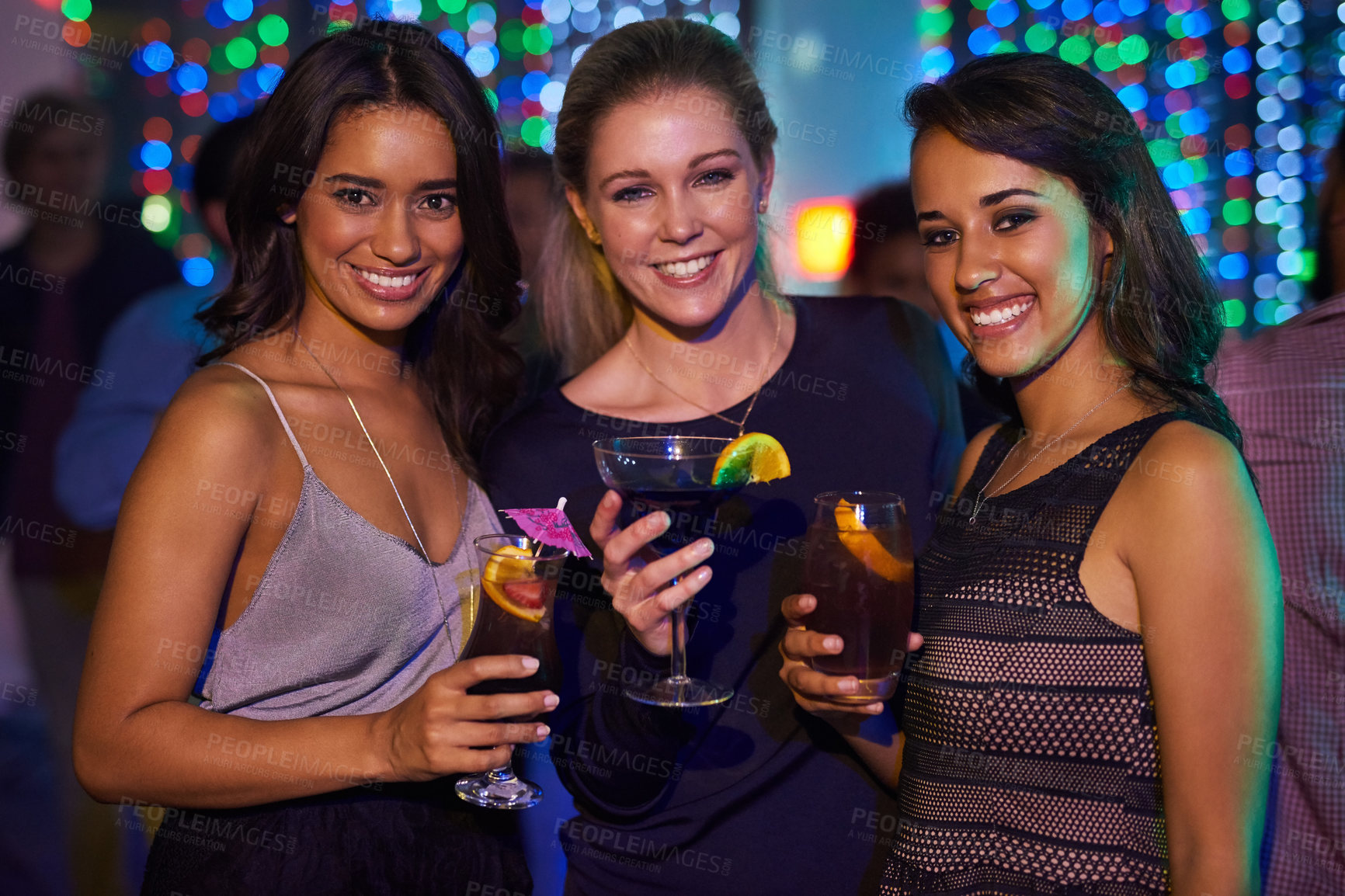 Buy stock photo Portrait of a group of friends having drinks together at a party