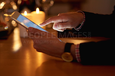 Buy stock photo Shot of an unrecognizable businessman using a digital tablet