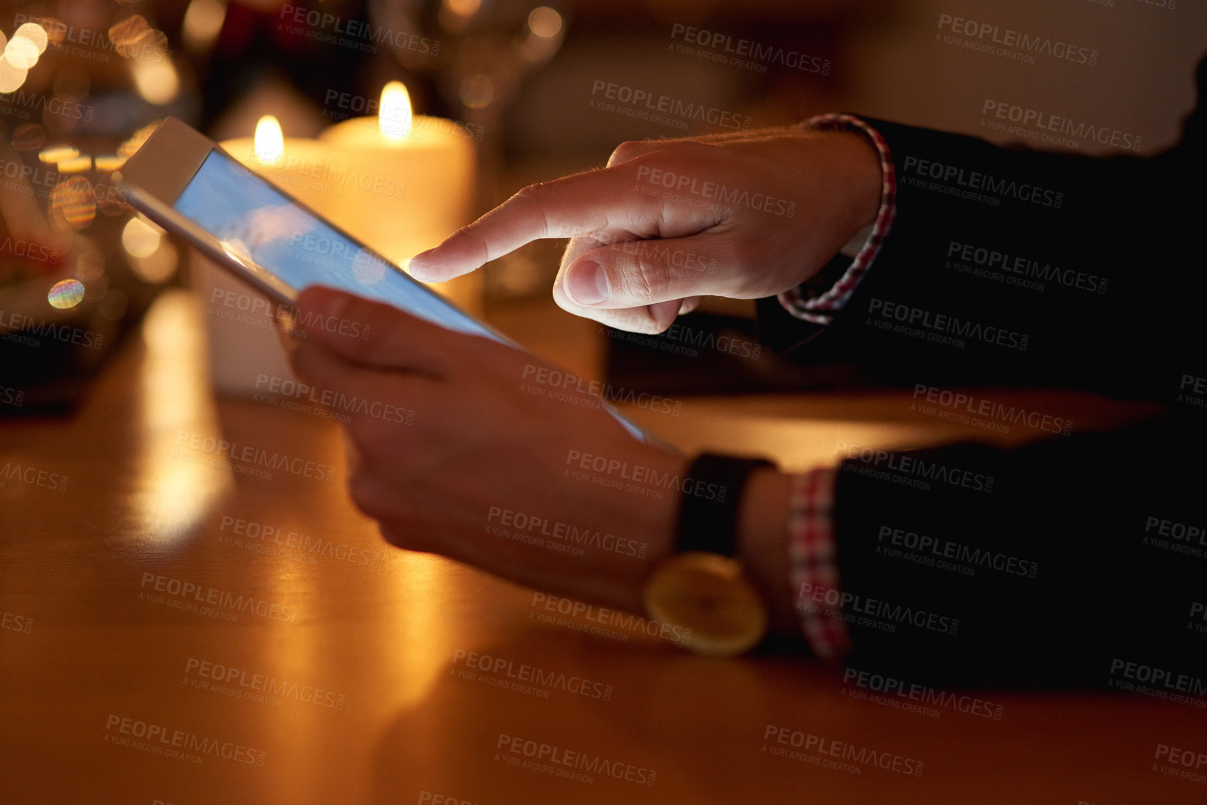 Buy stock photo Shot of an unrecognizable businessman using a digital tablet