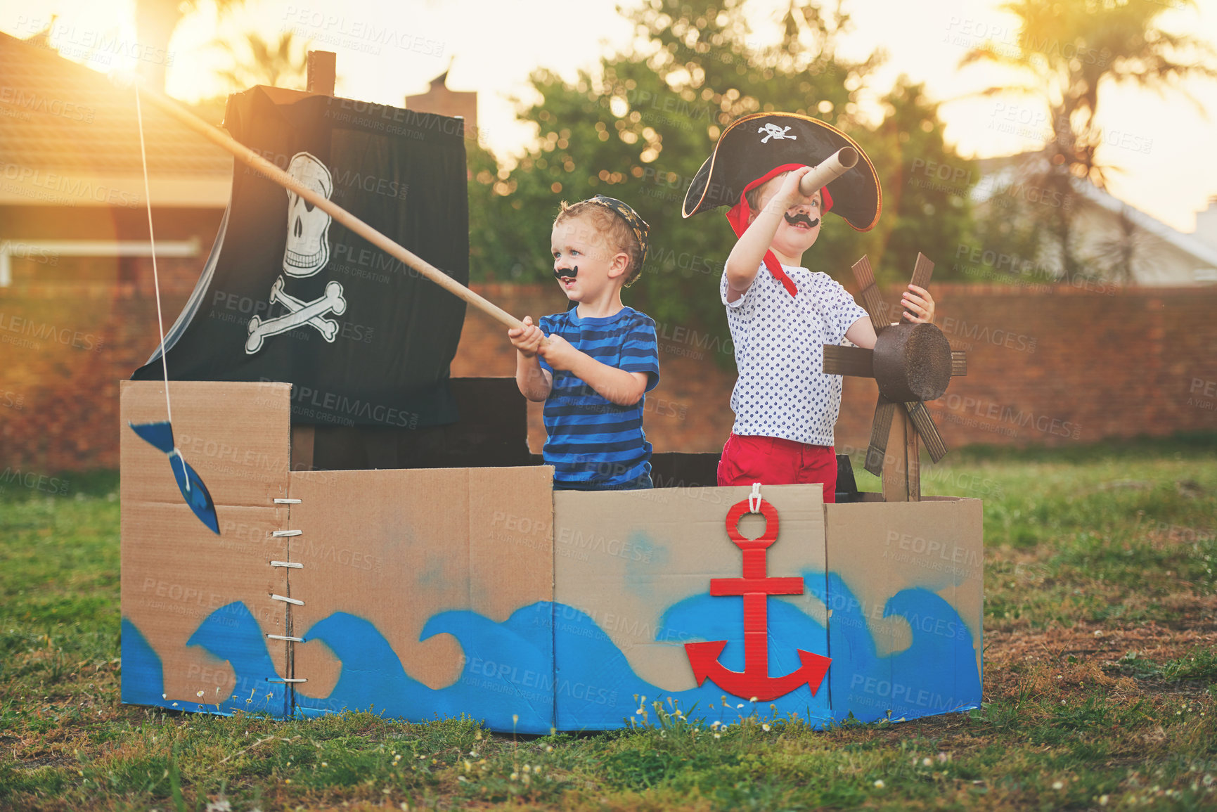 Buy stock photo Pirate, boat box and playing with children in backyard for brothers bonding, imagine and creative. Happy, youth and siblings for sailing captain in cardboard ship outdoor for fun, fantasy and games