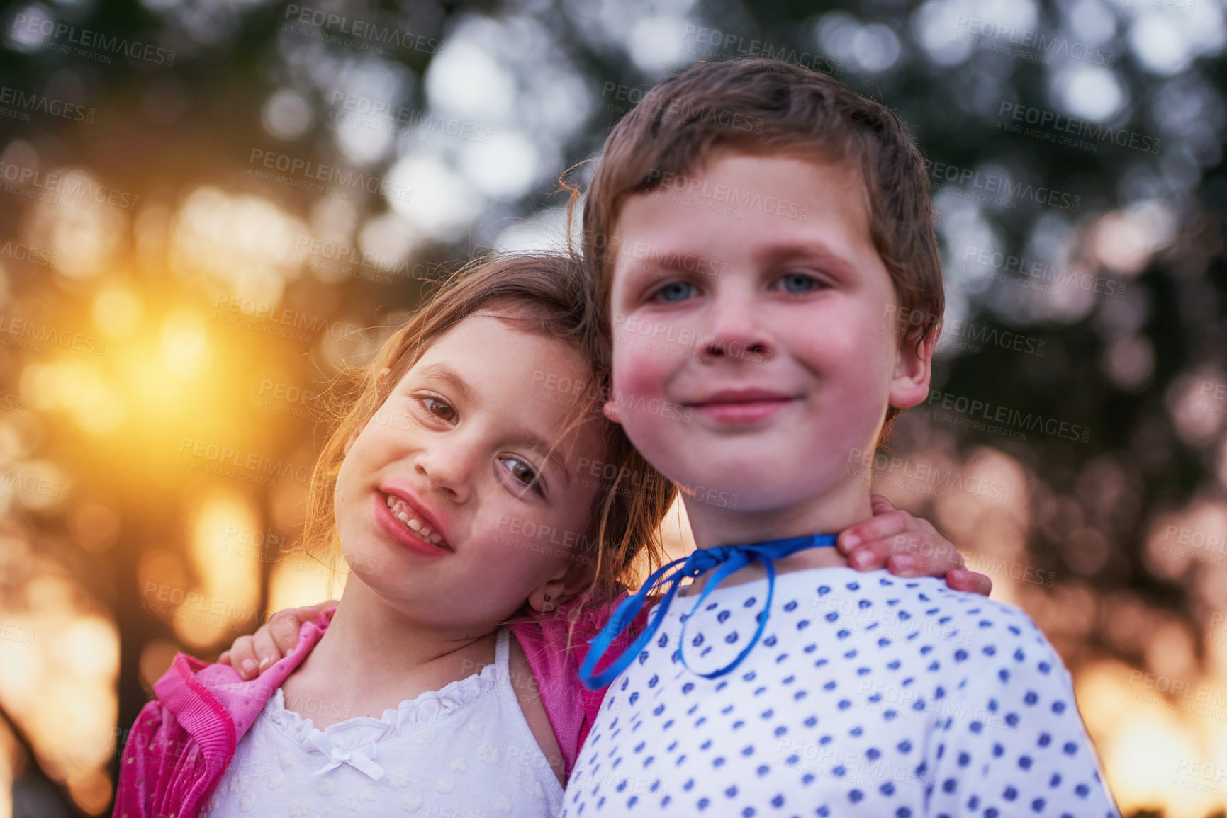 Buy stock photo Shot of a little boy and his sister standing outside