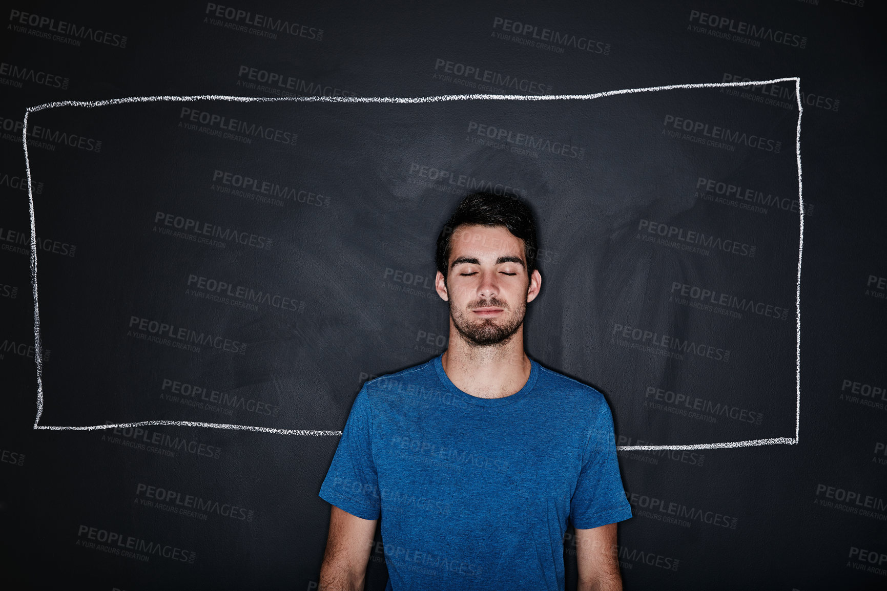 Buy stock photo Studio shot of a young man posing against a gray background