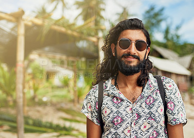 Buy stock photo Portrait of a happy young traveler taking in the sights on an island vacation