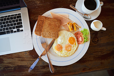 Buy stock photo Empty, breakfast and coffee on table in home with laptop for nutrition, protein or healthy dish in morning. Top view, toast and eggs for eating food, technology and room service with lunch break