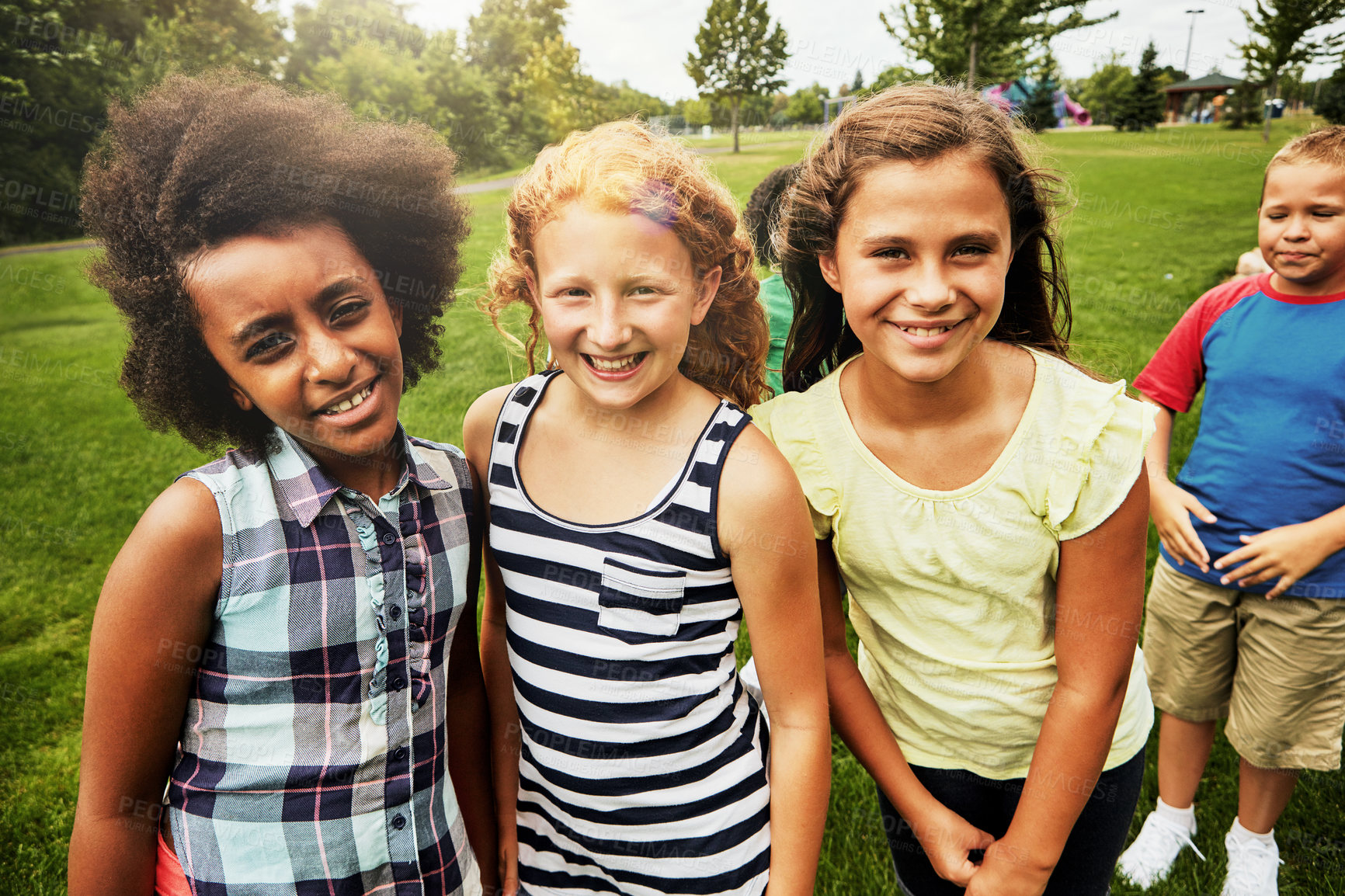 Buy stock photo Kids, park and portrait of group in playground to relax with friends on field on vacation. Happy, holiday and children together for party, games or smile outdoor at middle school on break at recess