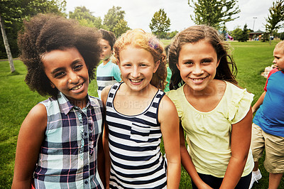 Buy stock photo Children, park and portrait of group in playground to relax with friends on field on vacation. Happy, holiday and kids together for party, games or smile outdoor at middle school on break at recess