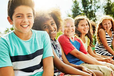 Buy stock photo Portrait, outdoor and kids on bench, friends and diversity with fun, summer and weekend break. Face, happy group and children in park, nature and bonding together with sunshine, playful and cheerful