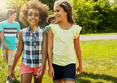 Buy stock photo Portrait of a group of diverse and happy kids hanging out together outside