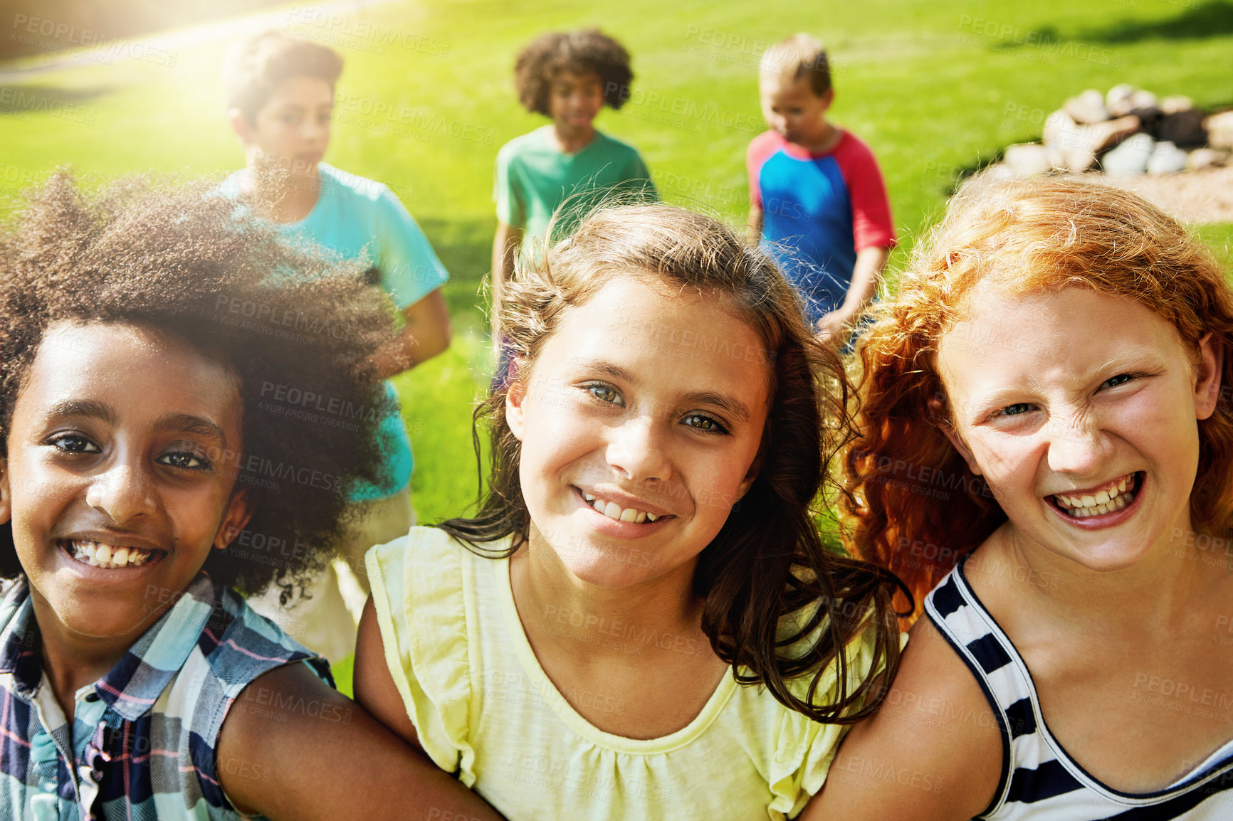 Buy stock photo Portrait of a group of diverse and happy kids hanging out together outside