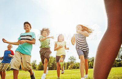 Buy stock photo Happy kids, diversity and playing with youth in nature for fun, playful day or summer at park. Group of excited children or friends enjoying sunny outdoor holiday or weekend on grass field together