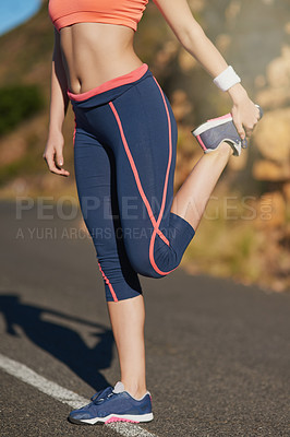 Buy stock photo Cropped shot of an unrecognizable young woman warming up before a workout