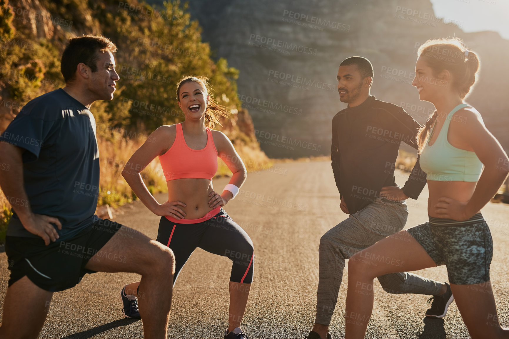 Buy stock photo Friends, people and stretching by mountain for fitness on road with diversity, lunge and exercise. Group, men and woman with training, workout and ready with warm up for muscle wellness in morning