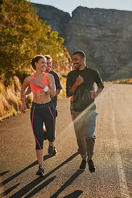 Buy stock photo People, friends and mountain running for cardio exercise as group for morning workout, road or training. Men, women and marathon practice or fitness community as club for  support, goals or wellness
