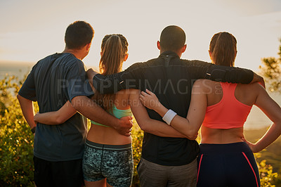 Buy stock photo Rearview shot of a fitness group admiring a scenic view