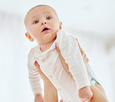 Buy stock photo Hands, bonding and baby in house, cute and care for infant, bedroom and together with child and love. Home, calm and person with boy, growth and development of youth, mother and parent with newborn