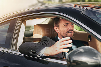 Buy stock photo Businessman, travel and frustrated while driving in car for commute to corporate work or job as entrepreneur of company. Man, motor vehicle and annoyed with traffic journey and transportation.