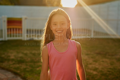 Buy stock photo Kids, portrait and girl in backyard for sunset games, learning or having fun on vacation, break or holiday. Smile, face or happy child in Indonesia with freedom, adventure and development in garden