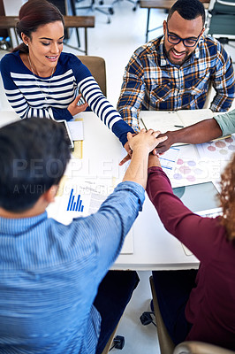 Buy stock photo Teamwork, designers or happy people with hands in stack for mission goal, collaboration or community. Graphs, partnership or staff in meeting for support, solidarity or group motivation in startup