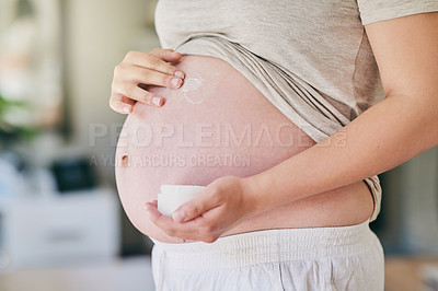 Buy stock photo Pregnancy, stomach and woman with cream in jar for maternity care, love and wellness in home. Family, parenting and hands of pregnant person with moisturizer for skincare, health and stretch marks