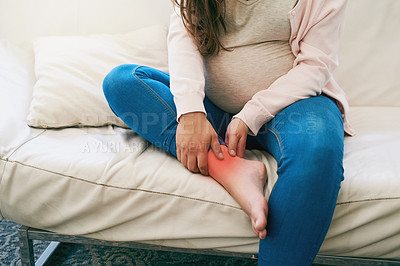 Buy stock photo Foot, pain and hands of pregnant woman on sofa with inflammation glow, joint or bone, burnout or risk at home. Injury, red and girl person with swollen ankle, discomfort or pregnancy fatigue in house