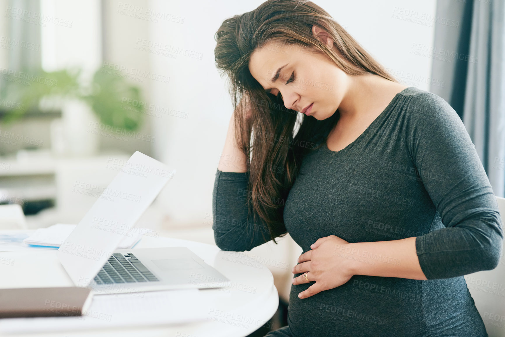 Buy stock photo Business, stress and pregnant woman with laptop in office overthinking stomach pain, mistake or fear. Pregnancy, anxiety and girl entrepreneur with belly ache, nervous and overwhelmed by fatigue