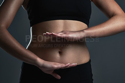 Buy stock photo Closeup shot of a sporty woman's midsection