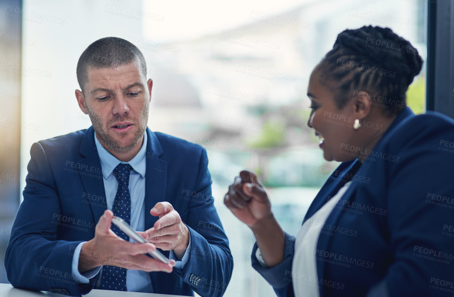 Buy stock photo Teamwork, people and cellphone in office for feedback, review and online for collaboration. Man, woman and technology for report with internet, mobile app and contact or discussion in workplace 