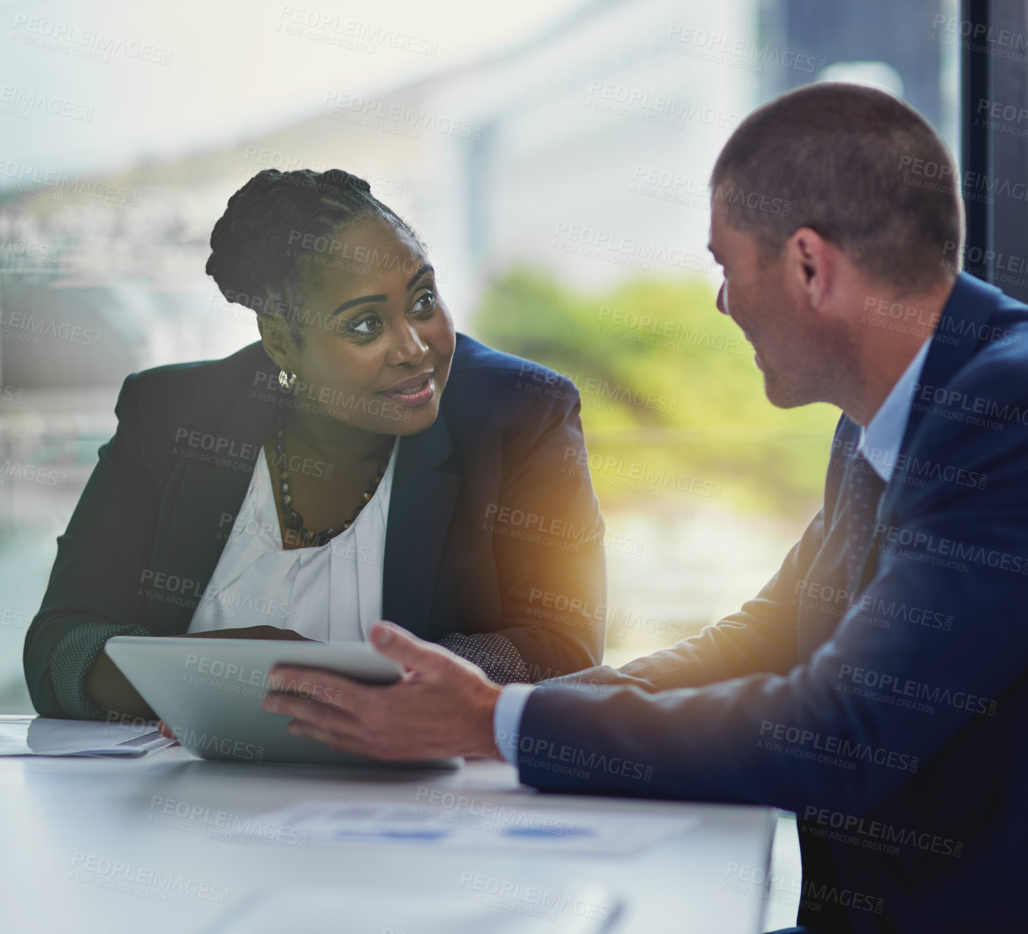 Buy stock photo Businessman, woman and tablet in office for feedback, review and online for collaboration. Teamwork, technology and discussion for financial report, internet or mobile app and talking in workplace 