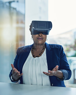 Buy stock photo Cropped shot of businesswoman wearing a VR headset in the office