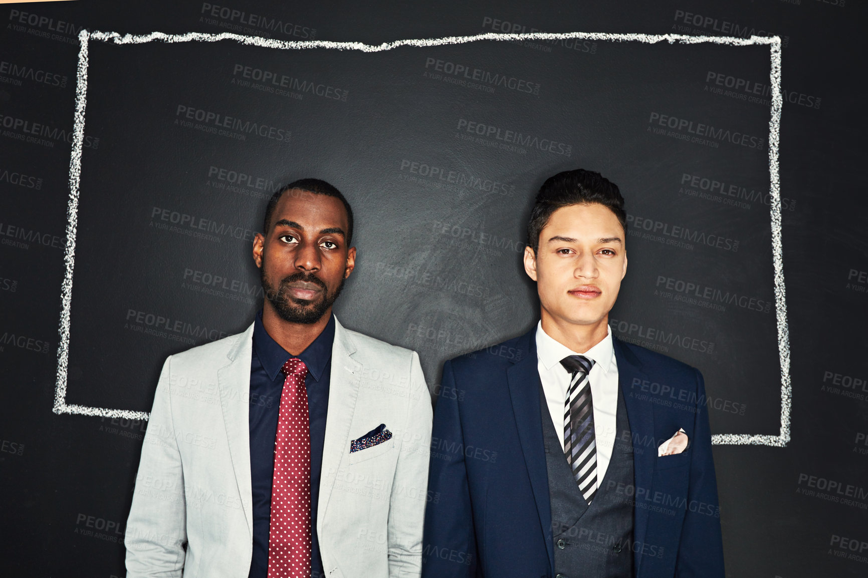 Buy stock photo Portrait of two young businessmen standing against a chalk illustration of a box on a dark background