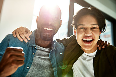 Buy stock photo Portrait of two young businessmen celebrating a victory in the office