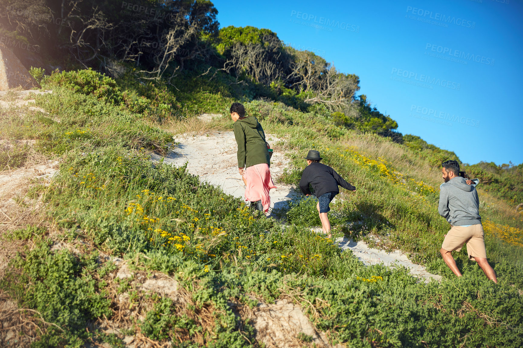 Buy stock photo Shot of a family of four spending the day outdoors