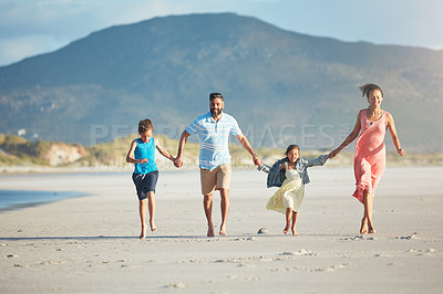 Buy stock photo Shot of people enjoying a day at the beach