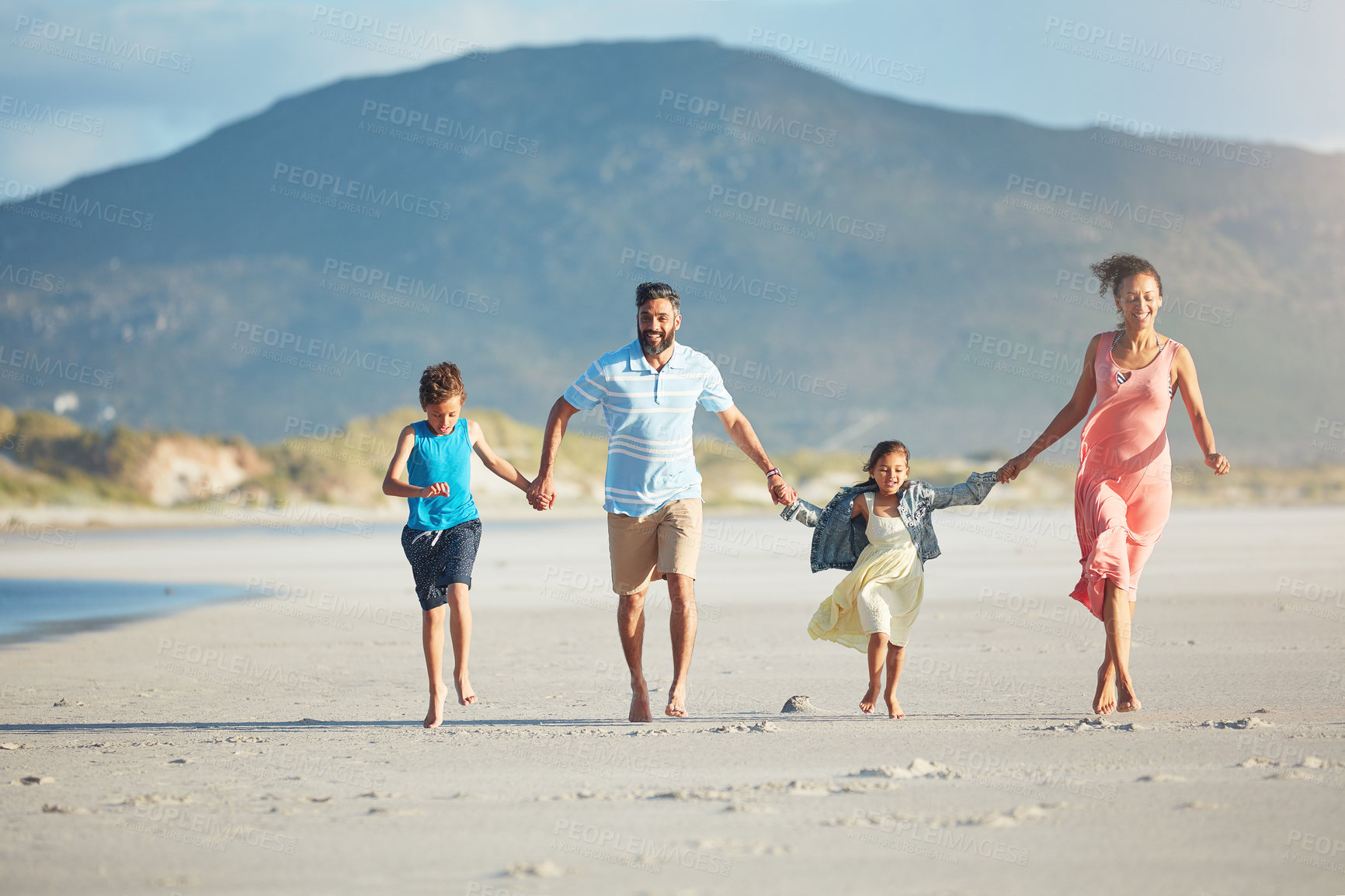 Buy stock photo Shot of people enjoying a day at the beach