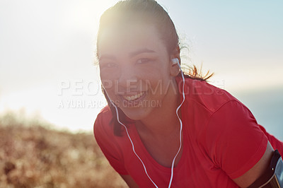 Buy stock photo Cropped portrait of an attractive young woman out for a morning run