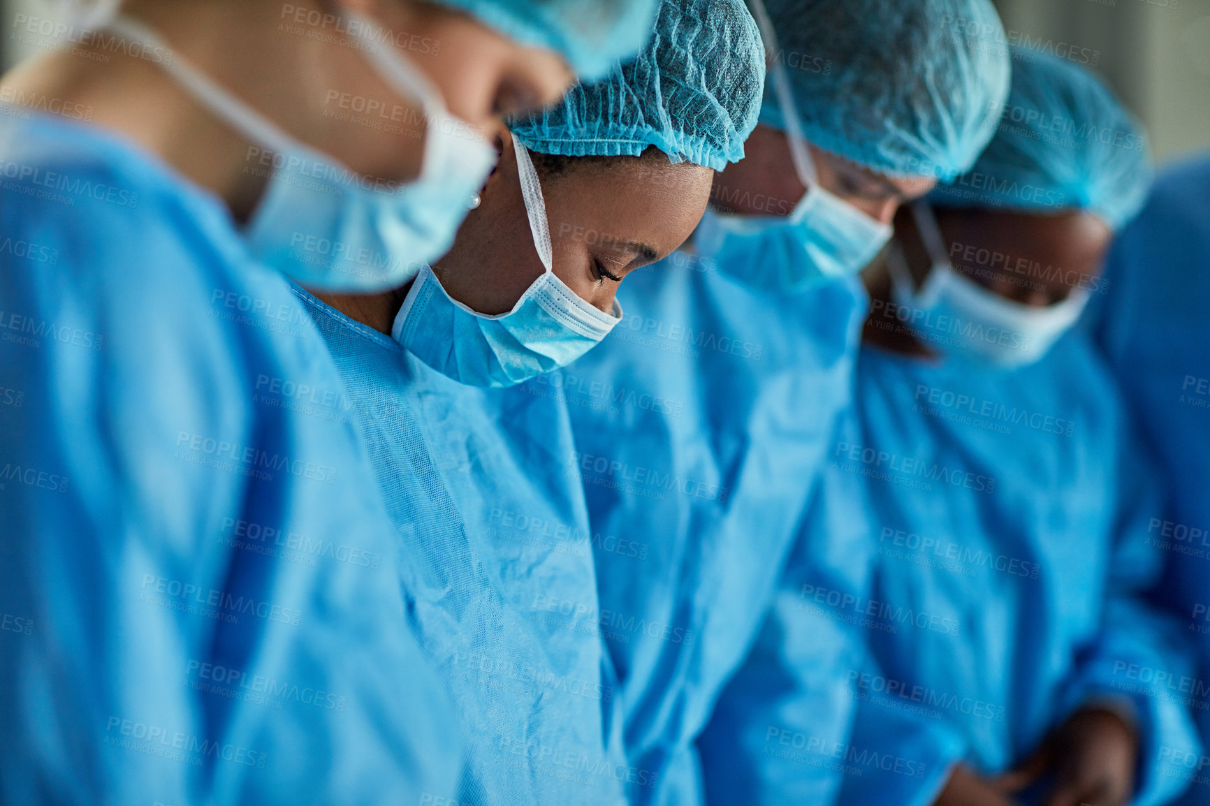 Buy stock photo Healthcare, group of surgeons working a medical operation and in a hospital building. Teamwork or collaboration, surgery and medic team or doctors with scrubs on with focus at clinic.