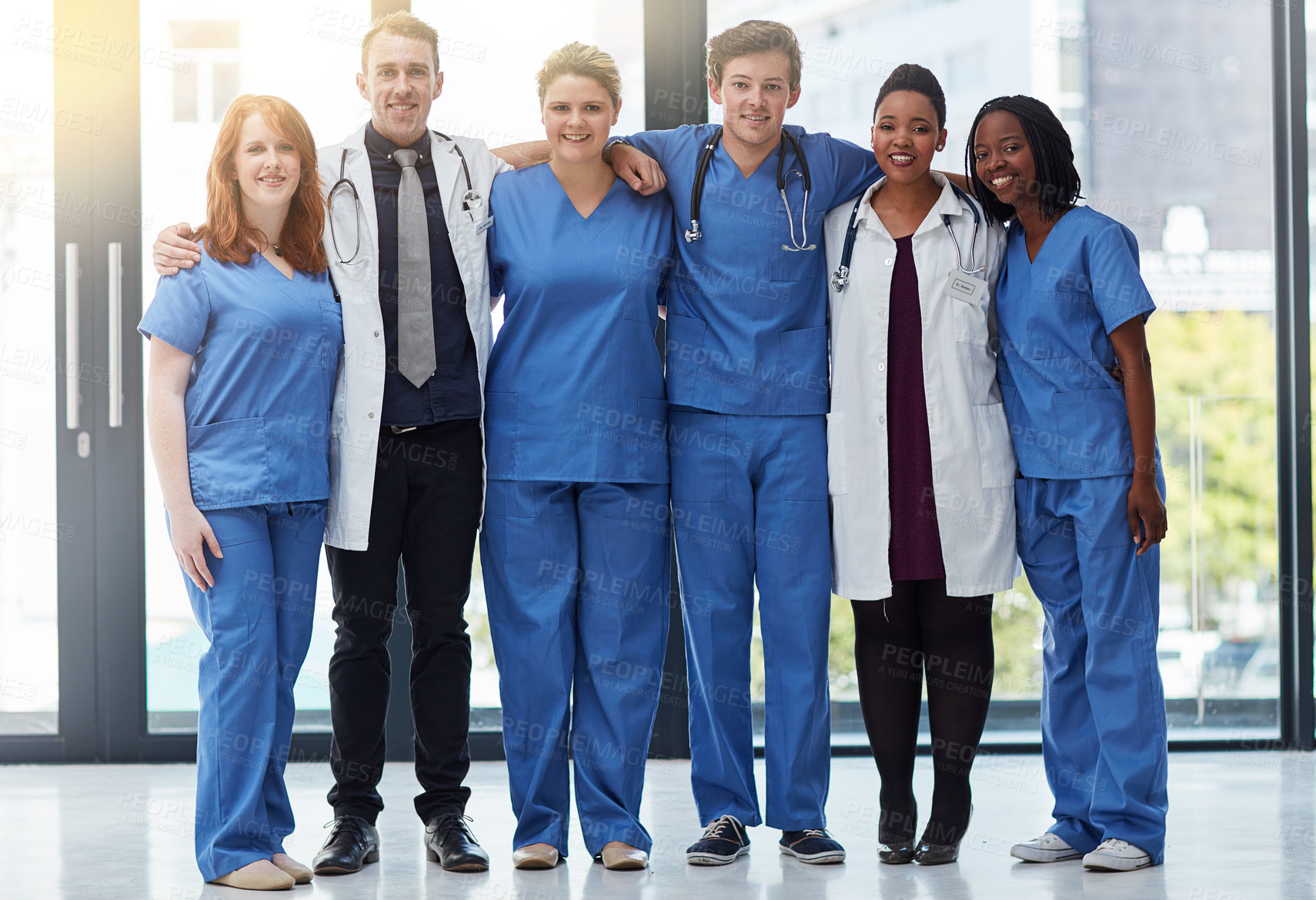 Buy stock photo Happy, portrait and medical team in hospital for diversity, about us or support in clinic service. Smile, people and healthcare group, doctors and expert professional nurses together for wellness