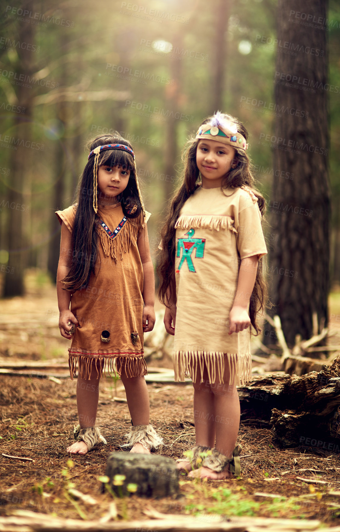 Buy stock photo Native American children, girl and nature for portrait with culture, heritage or connection in woods. Princess, siblings and family in forest for history festival in traditional clothes with smile