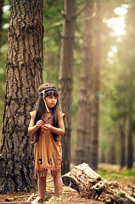 Buy stock photo Full length shot of a cute little girl playing dressup in the woods